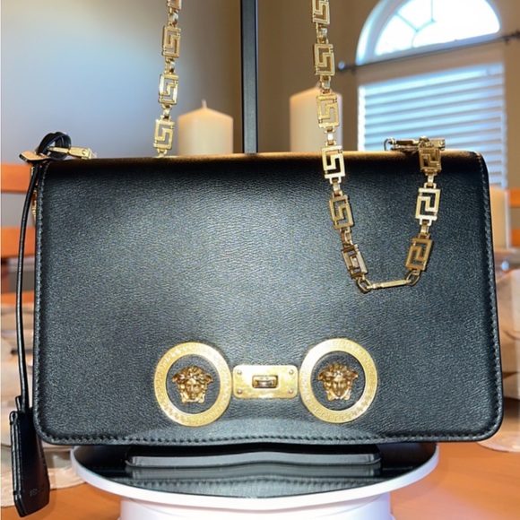 Versace Handbags - VERSACE leather turnlock crossbody/shoulder bag Pristine condition!